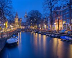 City of Amsterdam with canal during the night