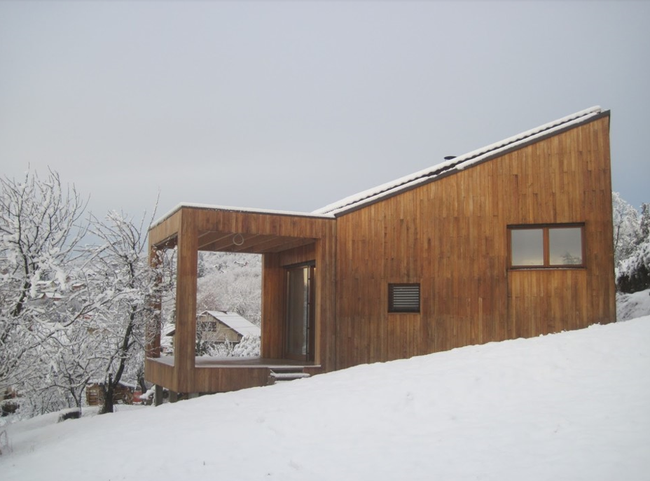 A house made of wood on a snowed mountain